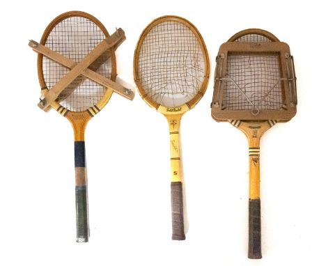 A collection of vintage Sporting equipment. Comprising Tennis and squash rackets plus cricket bats and stumps etc.