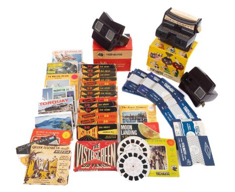 A collection of vintage 3D viewers and slides. Slides include 1969 moonlanding, wild animals and views of the Thames etc.