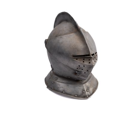 A contemporary reproduction helmet in the Close Helm style. Of resin construction with metal pins, 36cm high.