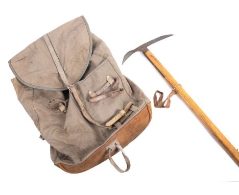 A mid 20th century Stubai Aschenbrenner ice axe. Having a steel head and pick with ash handle, complete with canvas strap and