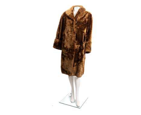 A collection of vintage lady's woollen and fur coats. A range of designs and sizes noting Charles Klein etc. 