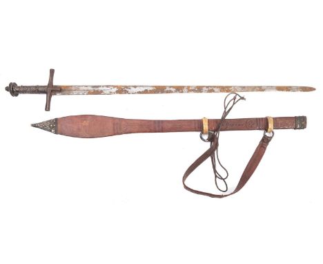 A Sudanese Kaskara sword ,the straight double edged  part fullered blade over steel hilt with langets,  white metal bound gri