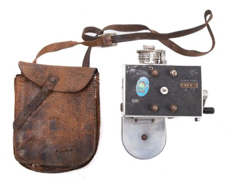 A 'Set Right' ticket machine together with a leather cash bag and an unused ticket roll.