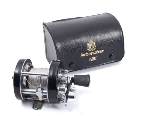 An ABU Ambassadeur 501C fishing reel. Complete with tool in black leatherette case and original damaged box.