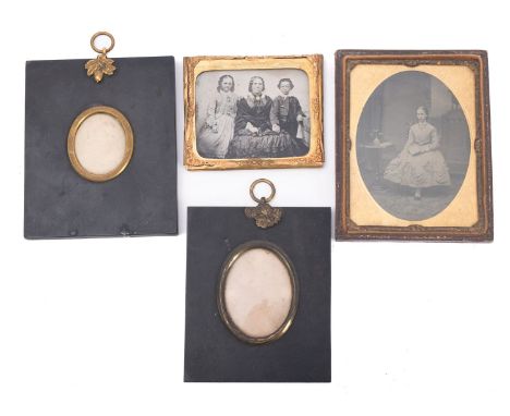 Two Victorian ambrotype portraits, together with two ebony and gilt metal  miniature frames.