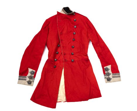 South Devon Militia. A Victorian red wool double breasted tunic/overcoat, with silver trimmed white wool collar and cloth ins