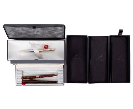 A collection of five Parker Sonnet ballpoint pen sets. In a range of colours noting a silver plated example, some with refill