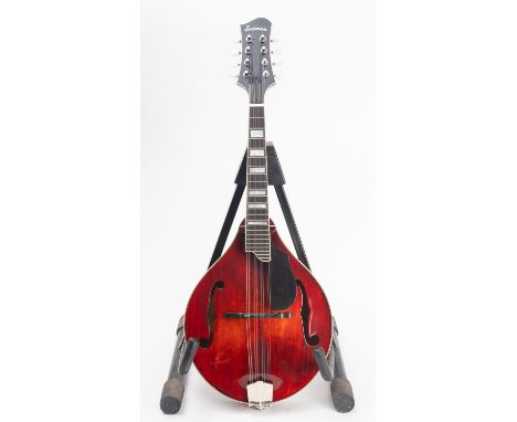 An Eastman MD605 Mandolin. Serial number N2003045, a handcrafted Mandolin with mother of pearl inlay to the neck and amp jack