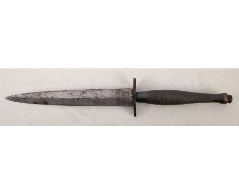 A Fairbairn Syke fighting knife by Wilkinson Sword Co Ltd of London. Second pattern circa 1941, the blade stamped "The F-S Fi