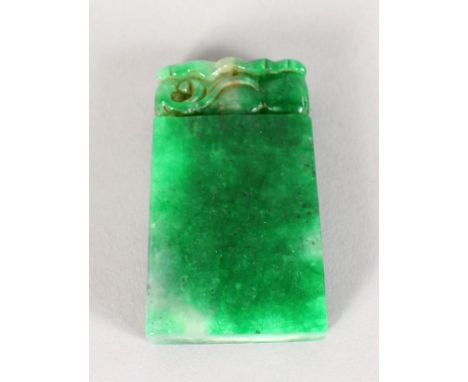 A CHINESE JADE DOG OF FOE SEAL.  2.75ins.