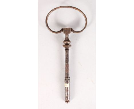A 17TH CENTURY POLISHED STEEL KEY, engraved with Earls Coronet and R. 7.5ins long.