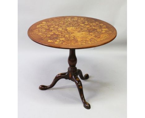 A GOOD 19TH CENTURY DUTCH MARQUETRY CIRCULAR TILT TOP TABLE with bird cage support, turned pillar supports ending in tripod c