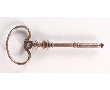A 17TH-18TH CENTURY STEEL KEY, engraved R.  7ins long.