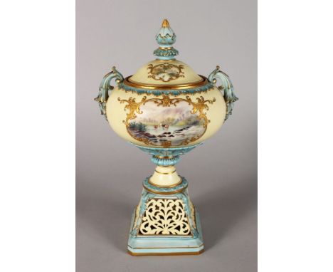 A LOCKE & CO WORCESTER TWO HANDLED URN ON STAND, the lid with 'C' vignette of a river, the body of the vase painted with catt