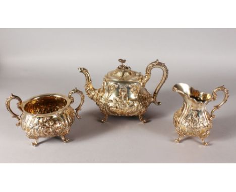 AN ELKINGTON & CO THREE PIECE TEA SET, comprising teapot, sugar basin and milk jug, with floral decoration, scrolls and masks