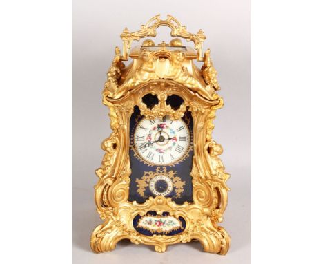 A LARGE SEVRES STYLE ORMOLU REPEATER CARRIAGE CLOCK, with floral decorated dial, the side panels decorated with courting coup