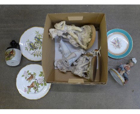 A Worcester cabinet plate, two Spode British Bird Series collectors plates; Wren and Blue Titmouse, two Szeiler dogs, a Beswi