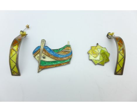 Two hallmarked silver and enamel pendants and a pair of similar earrings