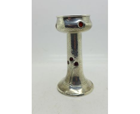 A hallmarked silver and enamel Arts and Crafts candlestick, London 1902, William Hutton, 11.5cm, a/f