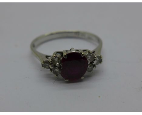 An 18ct white gold, ruby and diamond ring, ruby a/f, 2.8g, P