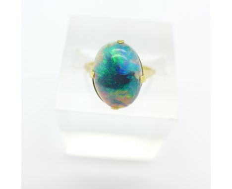 An Art Deco 18ct gold and cabochon opal ring, 3.0g, M, opal approximately 14mm x 11mm, small chip to underside of opal