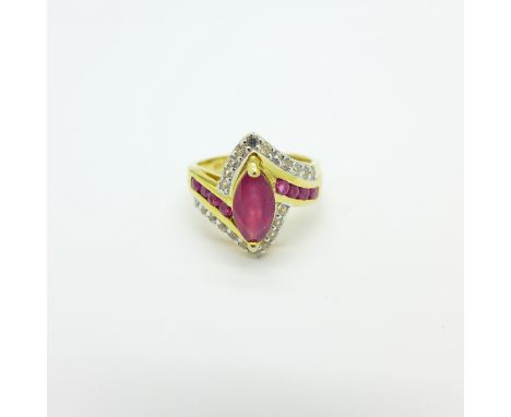 A silver gilt, ruby and zircon ring, M