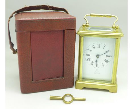 A French brass cased carriage clock, the movement marked R &amp; Co., made in Paris, the dial marked S. Smith &amp; Son Limit
