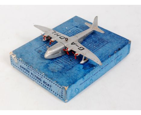 Dinky Toys, 60R Empire Flying Boat "Canopus", silver body with red propellers, G-A DHL to wings, with gliding loop, in the or