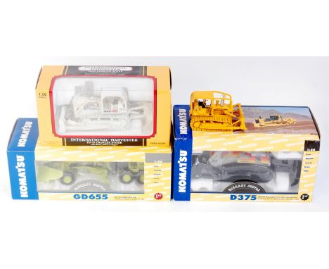 First Gear Komatsu and International Construction Diecast Group, 4 examples, to include Komatsu GD655 Grader with Snow Blades