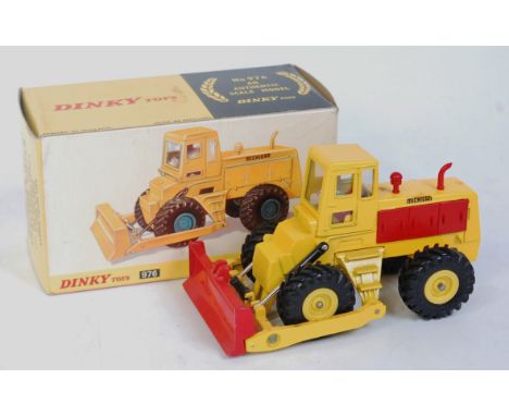 Dinky Toys, 976 Michigan 180-III tractor dozer, yellow and red body with red engine covers, in the original all-card box (NM-