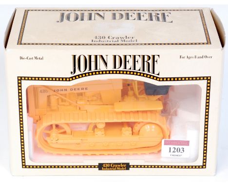 ERTL boxed 1/16th scale model of a John Deere 430 Crawler Industrial Tractor, finished in yellow, in the original window box 