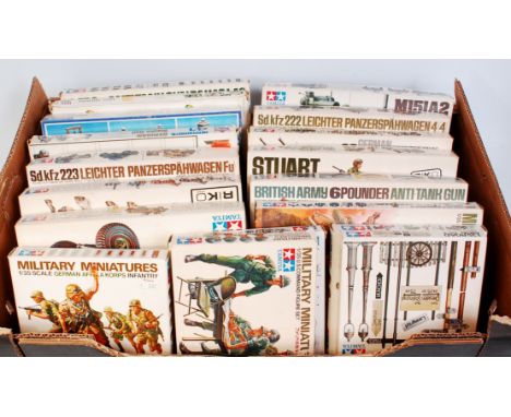 18 various Tamiya, ESCI and Italeri 1/35th scale plastic military vehicle and foot soldier kits, all appear un-made, examples