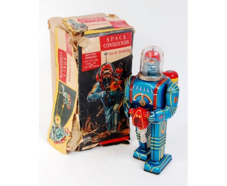 Daiya (Japan) tinplate and battery operated Space Conqueror Robot, 28cm, blue tin printed body with clear space helmet, missi