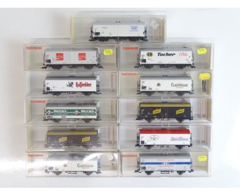 A mixed group of HO Gauge beer vans by FLEISCHMANN - VG/E in G boxes (11)