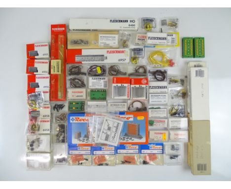 A large quantity of HO Gauge electrical and other accessories by FLEISCHMANN, ROCO etc. to include point motors, switches, co