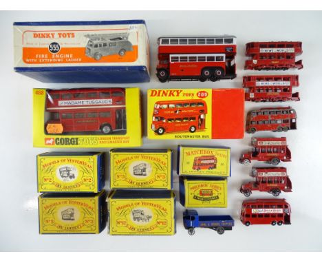 A quantity of vintage diecast comprising boxed buses and trams by MATCHBOX, MODELS OF YESTERYEAR, CORGI and DINKY together wi