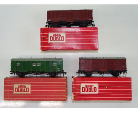 A trio of HORNBY DUBLO 4-wheel vans to include 2 x 4305 Passenger Fruit vans and 1 x 4323 SR Utility Van - G/VG in G boxes (3