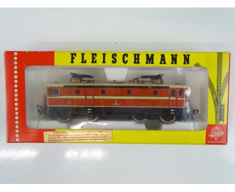 A FLEISCHMANN HO Gauge 4366 Austrian Outline electric locomotive in OBB orange / cream livery - G/VG in G box