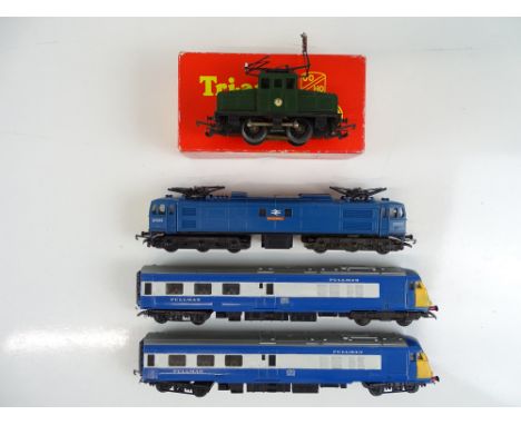 A group of TRI-ANG OO Gauge locomotives to include a blue Pullman Power Car pair and a Class EM1 electric locomotive in BR bl
