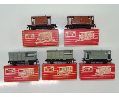 A group of HORNBY DUBLO brake vans to include an example of the 4310 LMS van in the rarer BR brown livery - G/VG in G/VG boxe