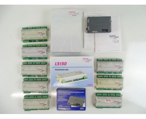 A large group of DCC accessory decoders by LENZ and FLEISCHMANN - G/VG in G boxes (where boxed) (9)