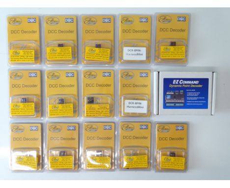A group of DCC accessories all in original packets to include a quantity of decoder chips by HATTONS and a BACHMANN E-Z Comma