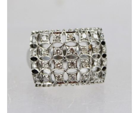 A WHITE GOLD LADY'S DRESS RING, with twenty-eight diamonds in a pierced setting, believed to be 18ct, unmarked, size K and ha