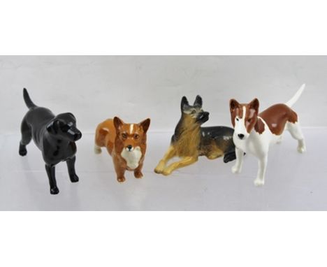 FOUR BESWICK CERAMIC MODEL DOGS, comprising an English Bull Terrier, a red and white Welsh Corgi, a black Labrador and a seat