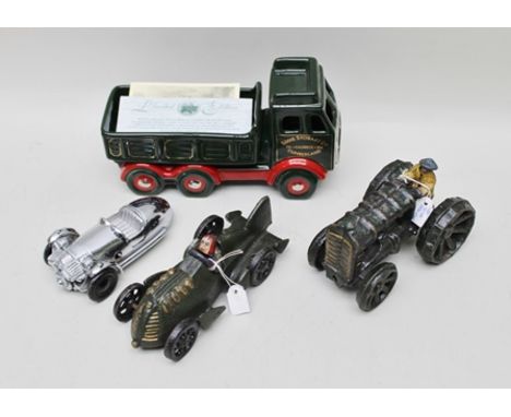 WADE CERAMICS MODEL OF AN EDDIE STOBART LTD LORRY limited edition 1410/2000 together with two heavy cast metal models one of 