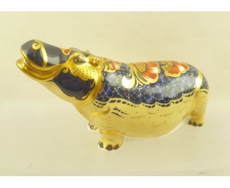 A ROYAL CROWN DERBY HIPPOPOTAMUS PAPERWEIGHT, gilded and decorated in the Imari palette, limited edition 1173/2500, with butt