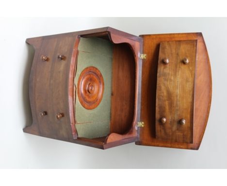 A 19TH CENTURY BOW FRONTED COMMODE with imitation four-drawer frontage, having typical lift-up lid with original interior, th