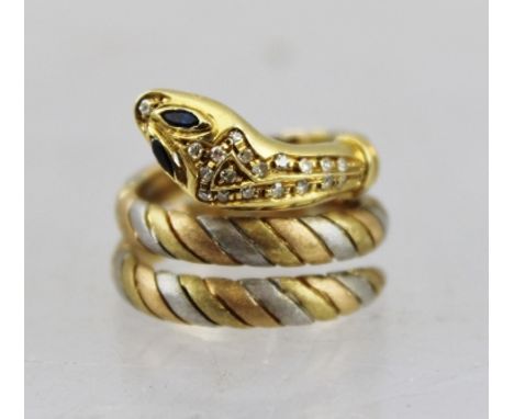 AN 18CT MULTICOLOUR GOLD SNAKE SCARF RING set with diamonds, with sapphire eyes, indistinctly marked 