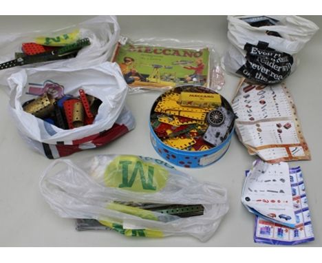 A LARGE COLLECTION OF MECCANO to include, original instruction manual for no.4 Outfit, clockwork motors and various other Mec