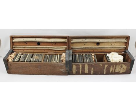TWO LATE 19TH CENTURY MAHOGANY MAGIC LANTERN SLIDE CASES CONTAINING HAND COLOURED PLATES, 8cm square, depicting the life of C